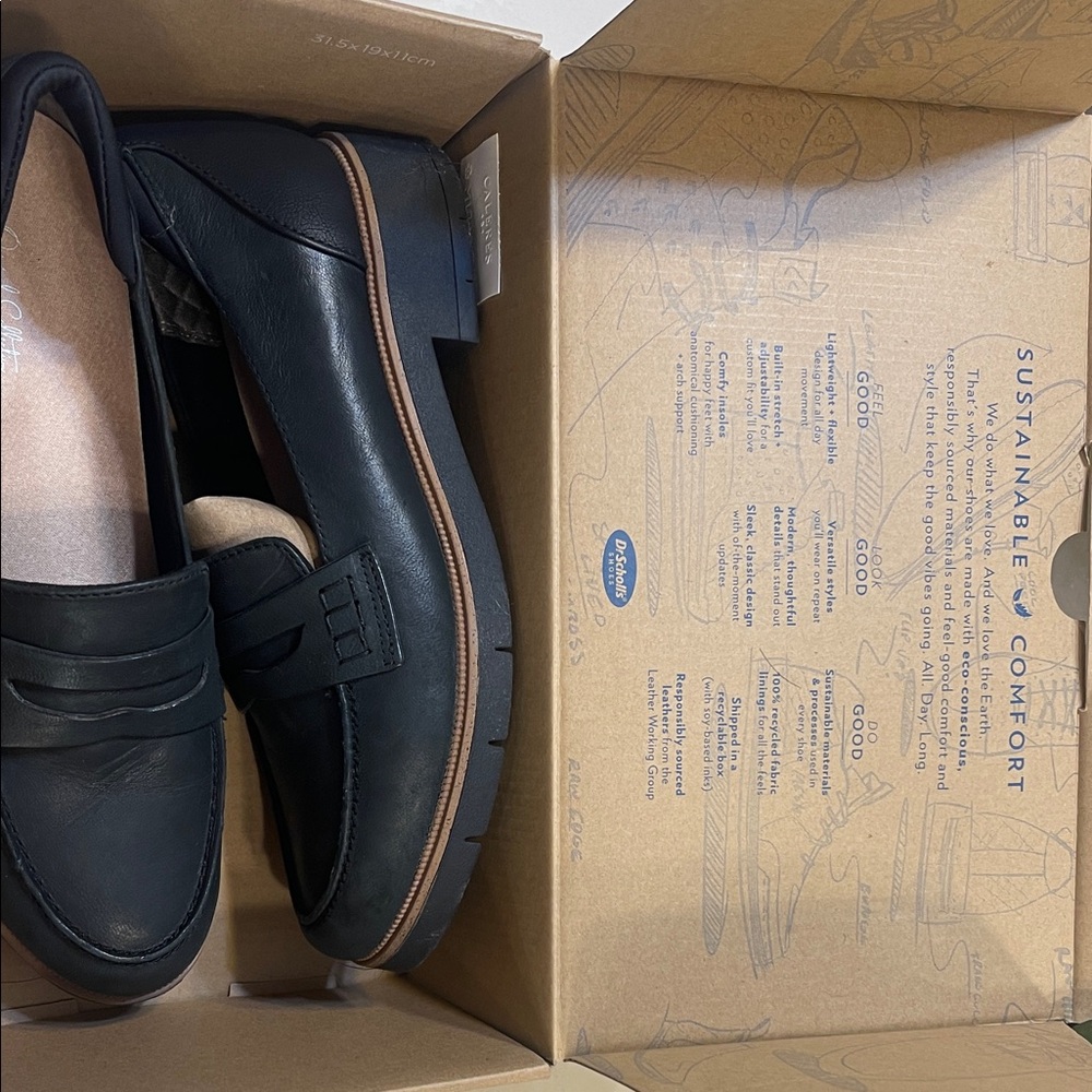 Dr. Scholl's Black Leather Penny Loafers with Tan Trim. Comfortable and stylish